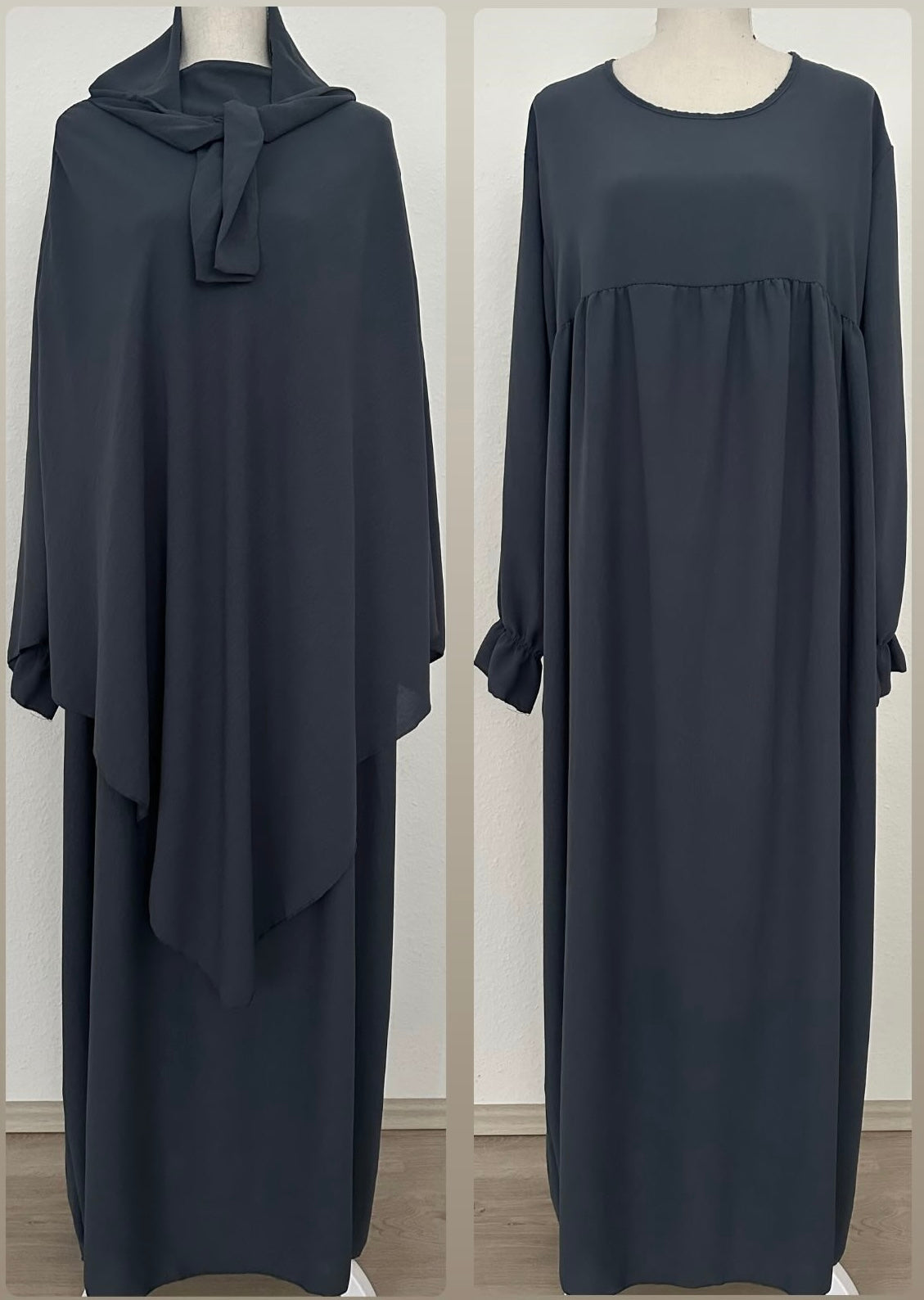 Abaya und Khimar in anthrazit; Khimar lang, gebunden vorn, Abaya mit geraffter Brust und Rüschenärmeln, Frontansicht.
